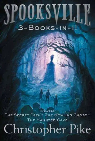 Spooksville book cover with eerie forest scene and ghostly figure in blue tones.